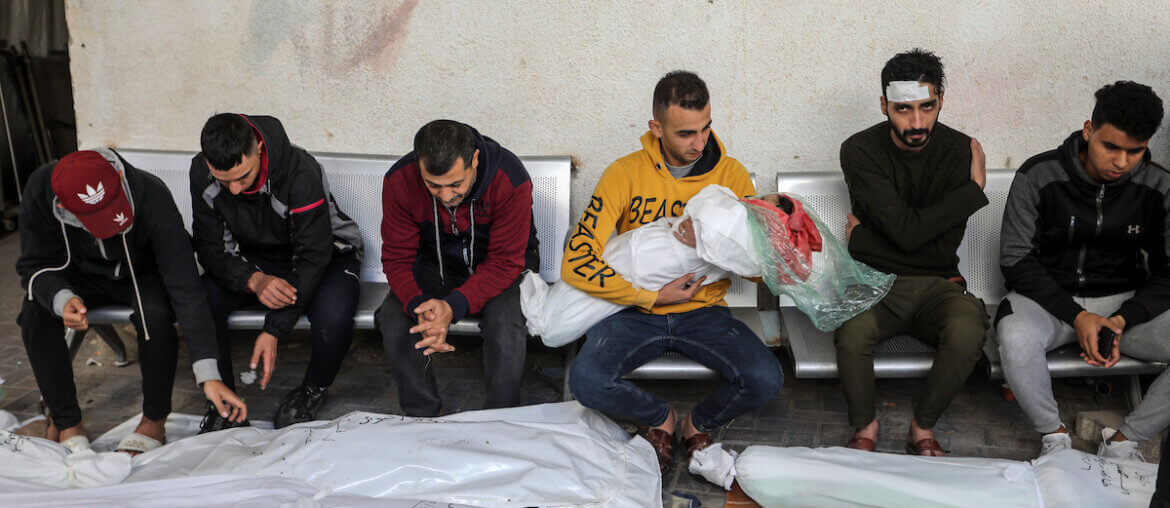Palestinians grieve their relatives and loved ones killed in an Israeli air strike, at Al-Najjar Hospital, December 7, 2023. (Photo: © Abed Rahim Khatib/dpa via ZUMA Press/APA Images)