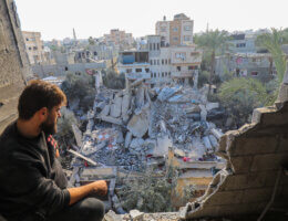 Palestinians survey the rubble of destroyed buildings following an Israeli bombardment in Deir El-Balah, in the central Gaza Strip, on December 24, 2023. (Photo: Naaman Omar/APA Images)