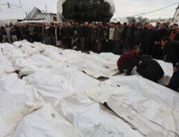 Palestinians attend the funeral held at the Al-Aqsa Martyrs Hospital for 70 people killed in Israeli airstrike on the al Maghazi refugee camp in Deir Al Balah, Gaza on December 25, 2023. (Photo: Omar Ashtawy/APA Images)