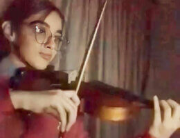 Lubna Alyaan practicing violin. (Photo courtesy of author)