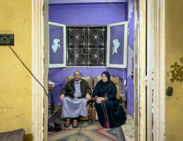 Mahmoud Ibrahim Mahmoud (left) and his wife Amnah Ali Ramadan (right), in an apartment in Cairo. (Photo: Mohammed Salem)