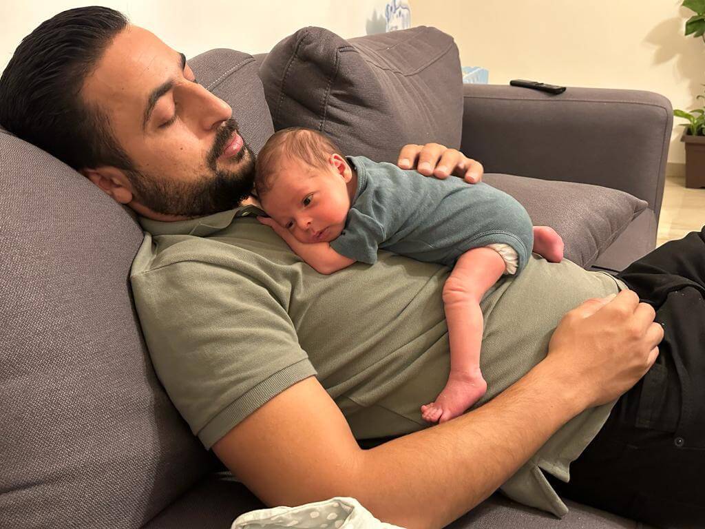 Anas Abu Srour, community activist arrested by Israel, with his baby