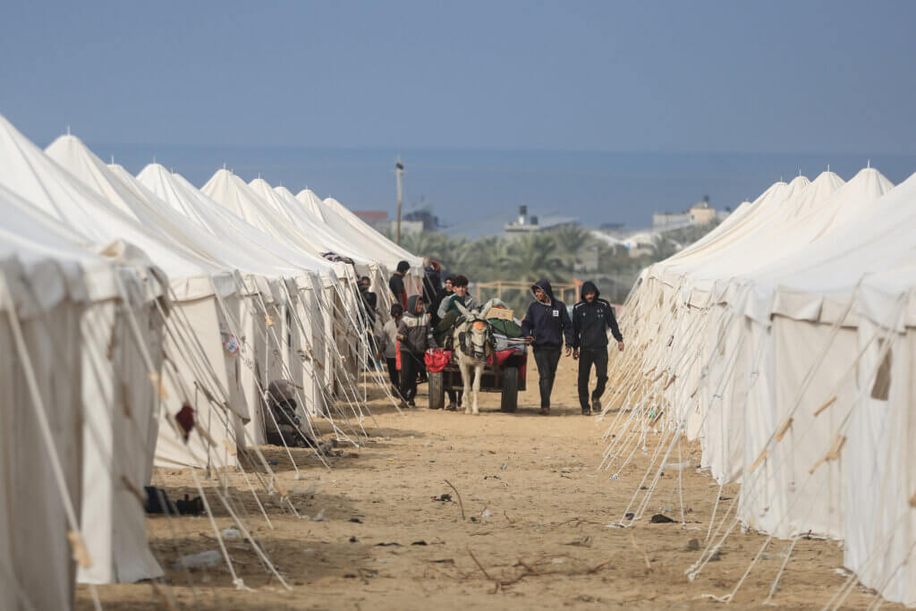 Displaced Palestinians in a tent city built by Egypt and the Palestinian Red Crescent in Khan Younis, January 2, 2024. (Photo: © Mohammed Talatene/dpa via ZUMA Press/APA Images)