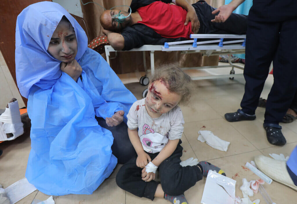 Palestinians injured in Israeli air strikes being treated at Al-Aqsa Hospital on January 6, 2024 in Deir El-Balah, Gaza. (Photo: Ali Hamad/APA Images)