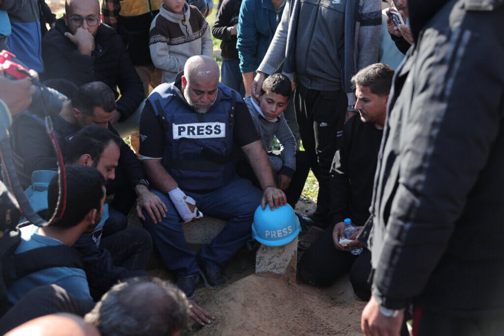 Al Jazeera's bureau chief in Gaza, Wael al-Dahdouh, at the funeral of his son Hamza, also an Al Jazeera journalist, who was killed in a targeted Israeli air strike in Rafah in the Gaza Strip on January 7, 2024. Wael Dahdouh, who was himself wounded in the arm, lost his wife and two other children in Israeli bombardment in the initial weeks of the war. (Photo: Bashar Taleb/APA Images)
