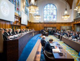 The International Court of Justice (ICJ) courtroom, on December 10, 2019, the opening day of the hearings in the case concerning the Application of the Convention on the Prevention and Punishment of the Crime of Genocide (The Gambia v. Myanmar) (Photo: UN Photo/CIJ-ICJ/Frank van Beek. Courtesy of the ICJ. All rights reserved.)