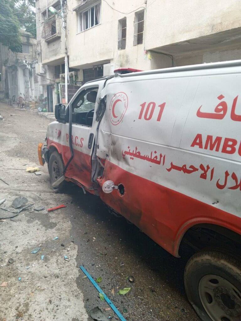 An ambulance is damaged by an explosion in the Tulkarem refugee camp.