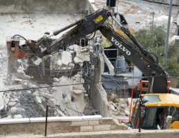 Israeli bulldozers demolish a Palestinian home in Silwan on January 4, 2023. (Photo: Saeed Qaq/APA Images)