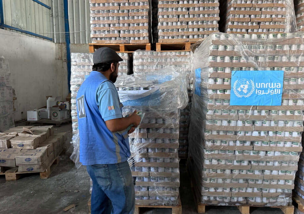 Workers of the United Nations Relief and Works Agency for Palestine Refugees (UNRWA) prepare medical aid for distribution to shelters, Deir al-Balah, November 4, 2023. (Photo: Suliman El-Fara/APA Images)