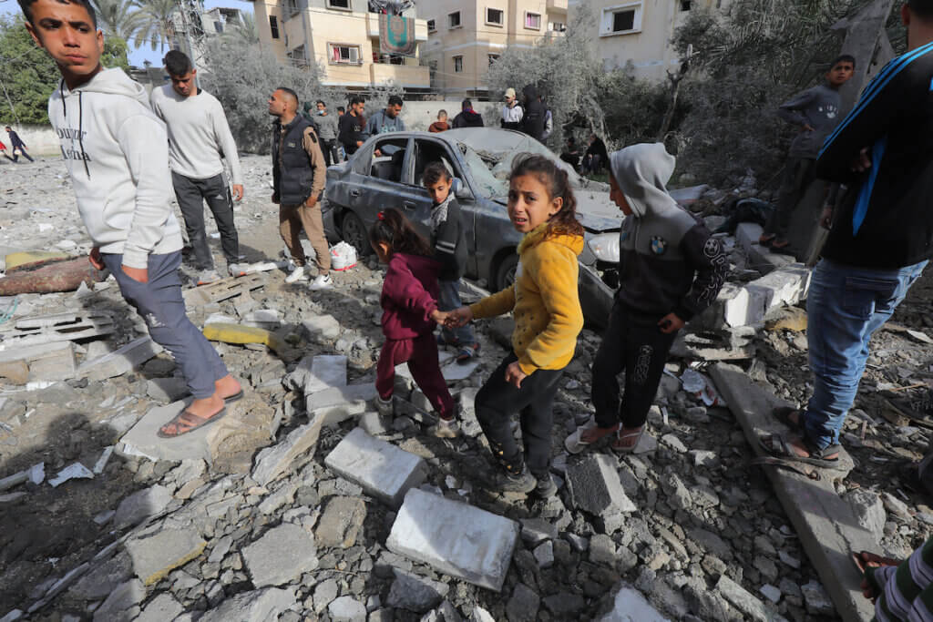 Palestinians inspect the wreckage of the El-Qahwagy family home following an Israeli attack in Deir El-Balah, Gaza on February 12, 2024. (Photo: Naaman Omar/APA Images)