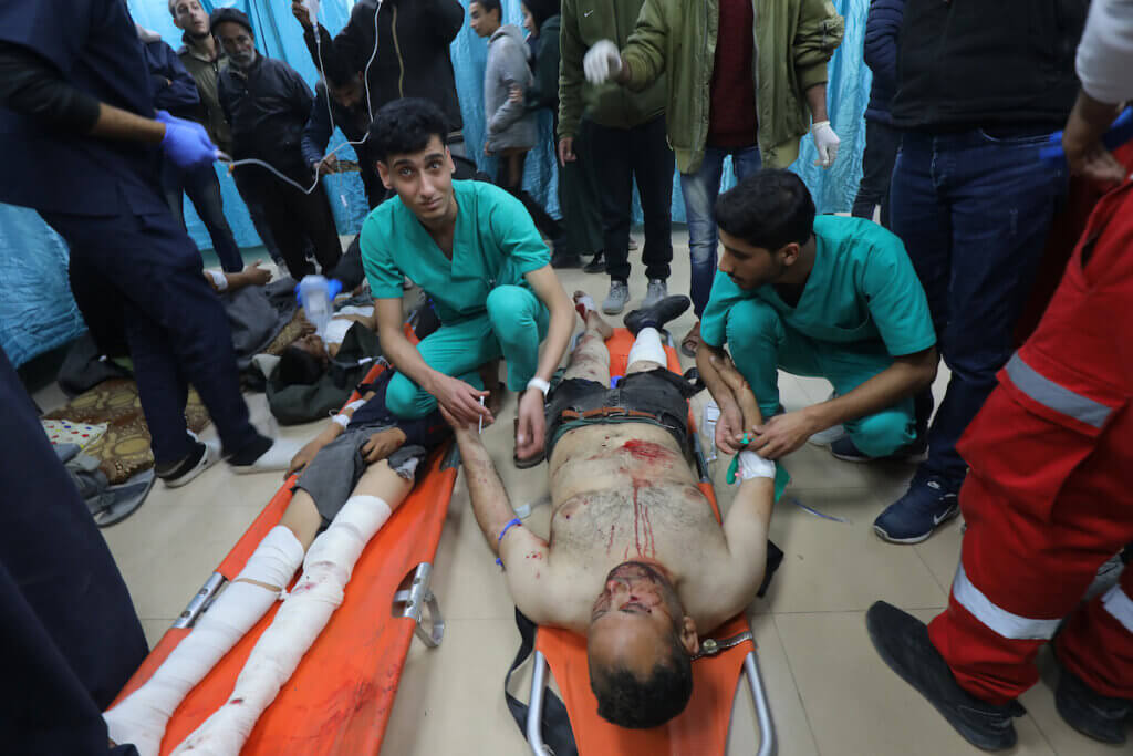 Injured Palestinians, are brought to Al-Aqsa Martyrs Hospital for treatment following the Israeli attacks in Deir El-Balah, Gaza on February 19, 2024. (Photo: Ali Hamad/APA Images)