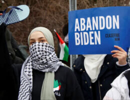 Screenshot from an Al Jazeera English story on a protest against Joe Biden's visit to Michigan on February 2, 2024