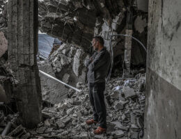 A Palestinian man inspects a destroyed building following an Israeli air attack on Rafah in the southern Gaza Strip, March 19 2024. (Photo: © Abed Rahim Khatib/dpa via ZUMA Press APA Images)