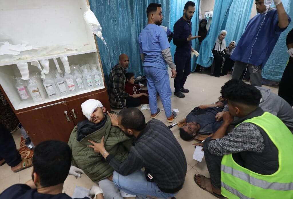 Doctors triage injured Palestinians, including children, in Al-Aqsa Martyrs Hospital in Deir El-Balah following an Israeli attack, on March 21, 2024. (Photo: Ali Hamad /APA Images)
