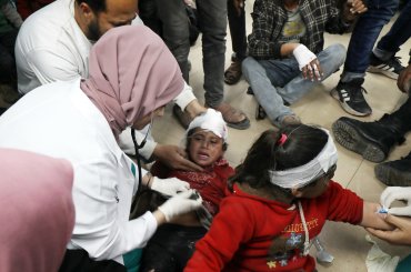 Doctors triage injured Palestinians, including children, in Al-Aqsa Martyrs Hospital in Deir El-Balah following an Israeli attack, on March 25, 2024. (Photo: Naaman Omar/APA Images)
