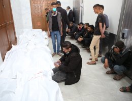Relatives of Palestinians killed in Israeli airstrikes receive the dead from the morgue of al-Najjar Hospital in Rafah, March 29, 2023. (Photo: Ahmed Ibrahim/APA Images)