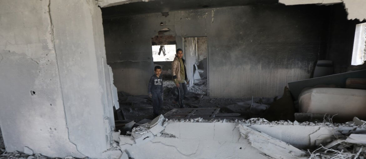 Palestinians inspect the damage to a building after an Israeli bombardment in Al-Maghazi in the central Gaza Strip on March 31, 2024. (Photo: Omar Ashtawy/APA Images)