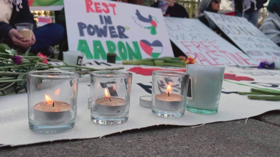 A vigil for Aaron Bushnell outside the Israeli embassy in Washington one day after his death. Photo from Democracy Now!