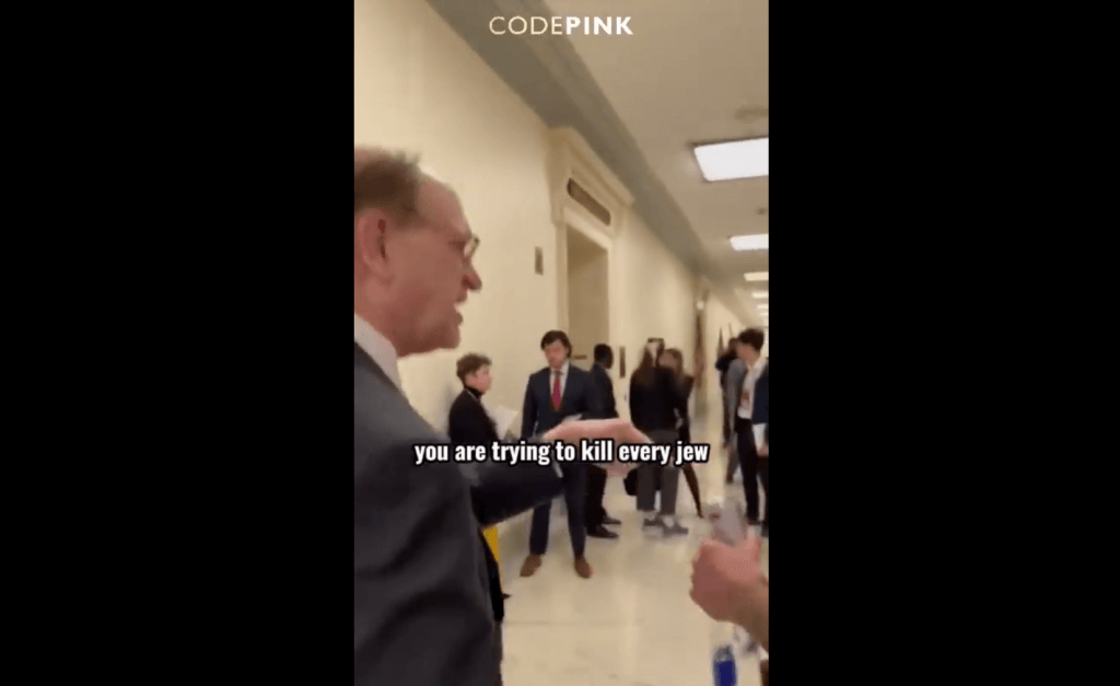 Protesters affiliated with the antiwar group Code Pink seek to ask Rep. Brad Sherman about his support for the massacres of Palestinians in Gaza, in a video posted March 20, 2024. The congressman from Los Angeles/Malibu ran away from the protesters and accused them of seeking the genocide of Jews. Screenshot.