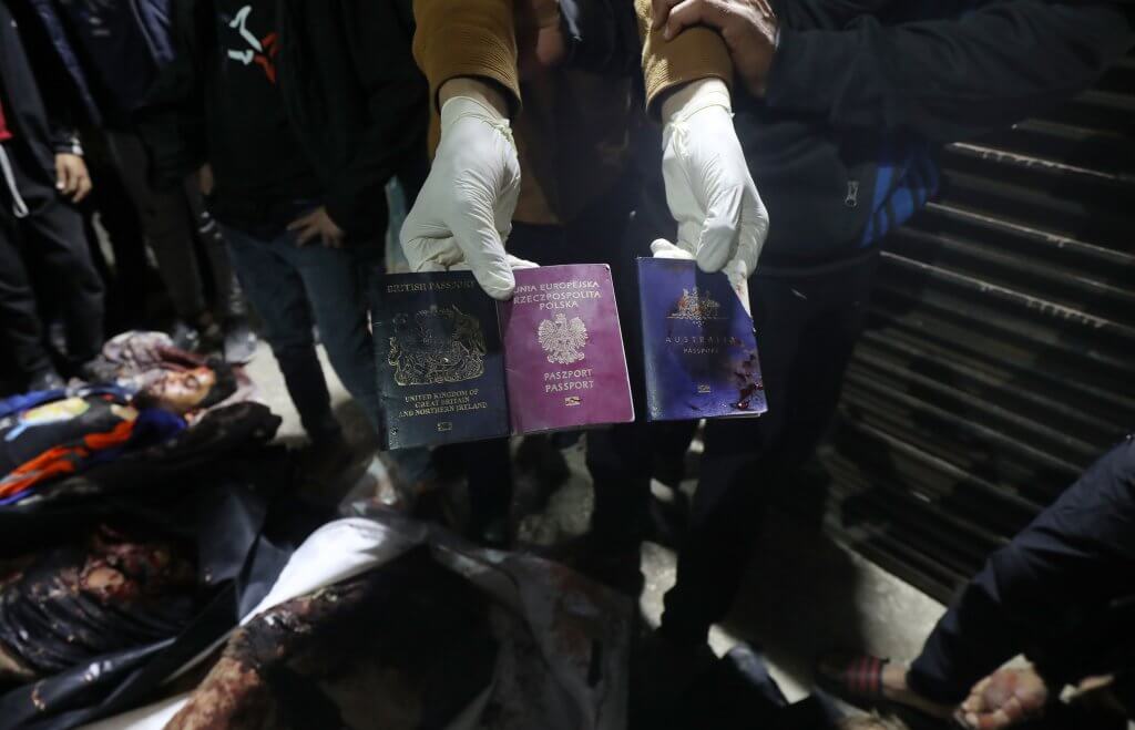 Passports of the international volunteers with the World Central Kitchen killed in a targeted Israeli airstrike, Deir al-Balah, central Gaza. (Photo: Omar Ashtawy/APA Images)