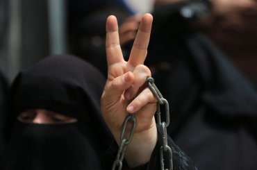 FILE: Palestinians take part in a protest in solidarity with prisoners in Israeli jails marking Palestinian Prisoner's Day, in front of Red cross office, in Gaza city on April 17, 2022. On April 17 of each year, Palestinian Prisoner's Day is marked to highlight the plight of Palestinian political prisoners and detainees in Israeli prisons and call for their freedom. (Photo: Ashraf Amra/APA Images)