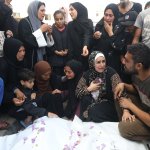 Relatives of the Palestinians killed in Israeli airstrikes mourn as they receive bodies from the morgue at Al-Aqsa Hospital in Deir al-Balah, Central Gaza, April 28, 2024. (Photo: Ali Hamad/APA Images)