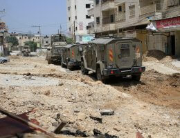 Israeli armored vehicles destroy infrastructure in Jenin refugee camp, May 21, 2024. (Photo: Mohammed Nasser/APA Images)