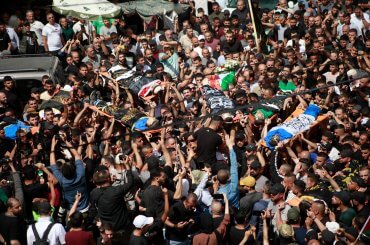 Hundreds attend the funeral for the 12 martyrs of the Israeli army's invasion of Jenin and Jenin refugee camp, May 23, 2024. (Photo: Mohammed Nasser/APA Images)
