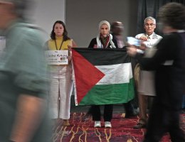 Pastors, students, laity, and delegates have a silent protest against the violence in Palestine during the 2024 United Methodist General Conference in Charlotte, N.C. Tuesday April 30, 2024. (Photo by Larry McCormack, UM News)