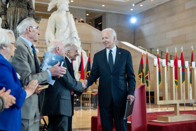 Biden gives speech on Holocaust memorial day, at US Capitol, May 7, 2024. Here he is greeted by Stu Eizenstat, to his immediate right, a State Department special adviser on Holocaust issues. From Biden's twitter feed.