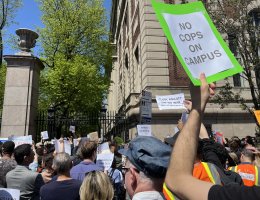 James Schamus, center in blue cap, at a Columbia University faculty protest at the Amsterdam Gate.