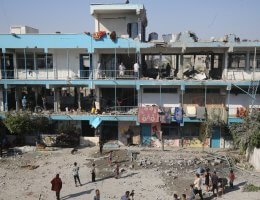 Palestinians inspect a damaged UNRWA school following an Israeli airstrike on a the displacement shelter in Nuseirat refugee camp, June 06, 2024. (Photo: Omar Ashtawy/APA Images)