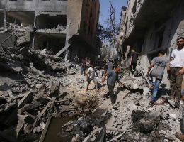 Palestinians gather in front of demolished buildings following the Israeli invasion of the Nuseirat refugee camp in the Gaza Strip, on June 8, 2024. (Photo: Omar Ashtawy / APA Images)