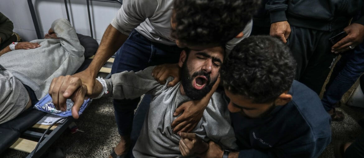 Palestinian men who were arrested during the Israeli ground invasion of northern Gaza receive medical treatment after their release at Al-Najjar Hospital in Rafah, December 24, 2023. (Photo: © Abed Rahim Khatib/dpa via ZUMA Press/APA Images)