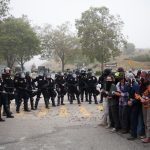 In the early morning of May 31, heavily armed police in riot gear surrounded student protesters. (Photo: Kyle Allemand)