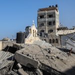 People inspect a destroyed building belonging to the Greek Orthodox Church in Gaza following an Israeli airstrike, on October 20, 2023. (Credit Image: © Mohammad Abu Elsebah/dpa via ZUMA Press APAimages)