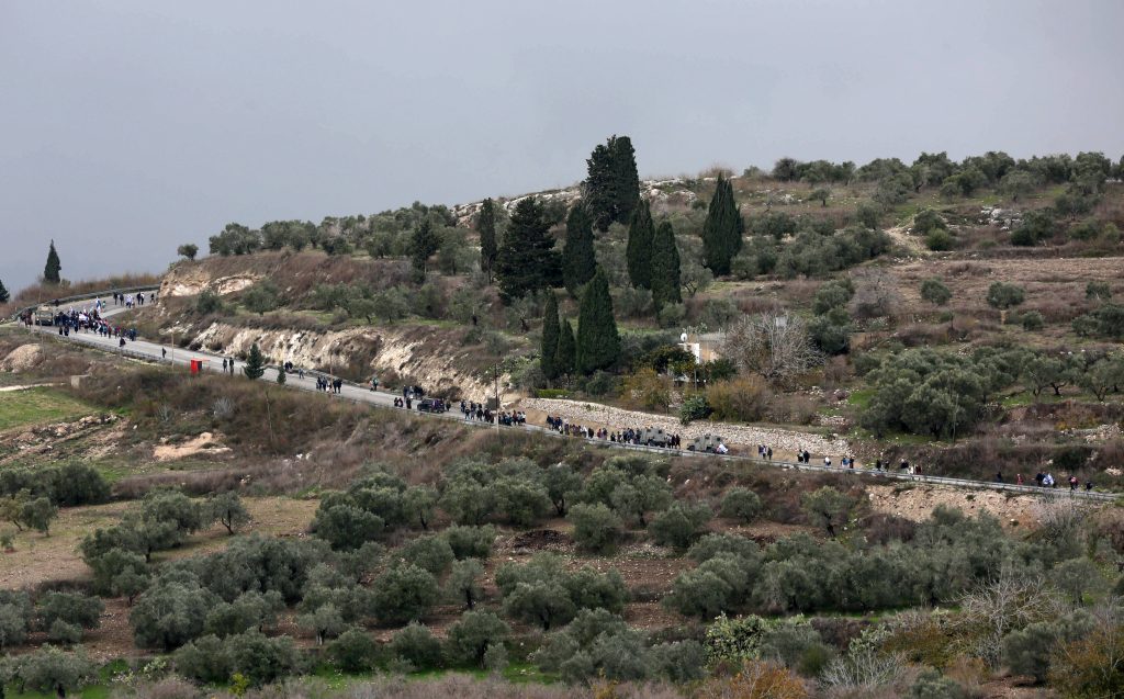 Israeli settlers return to the illegal Israeli outpost of Homesh, December 23, 2021. (Photo: Wajed Nobani/APA Images)