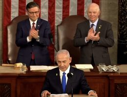 Benjamin Netanyahu is applauded by Rep. Mike Johnson and Sen. Ben Cardin during his speech to Congress on July 24, 2024