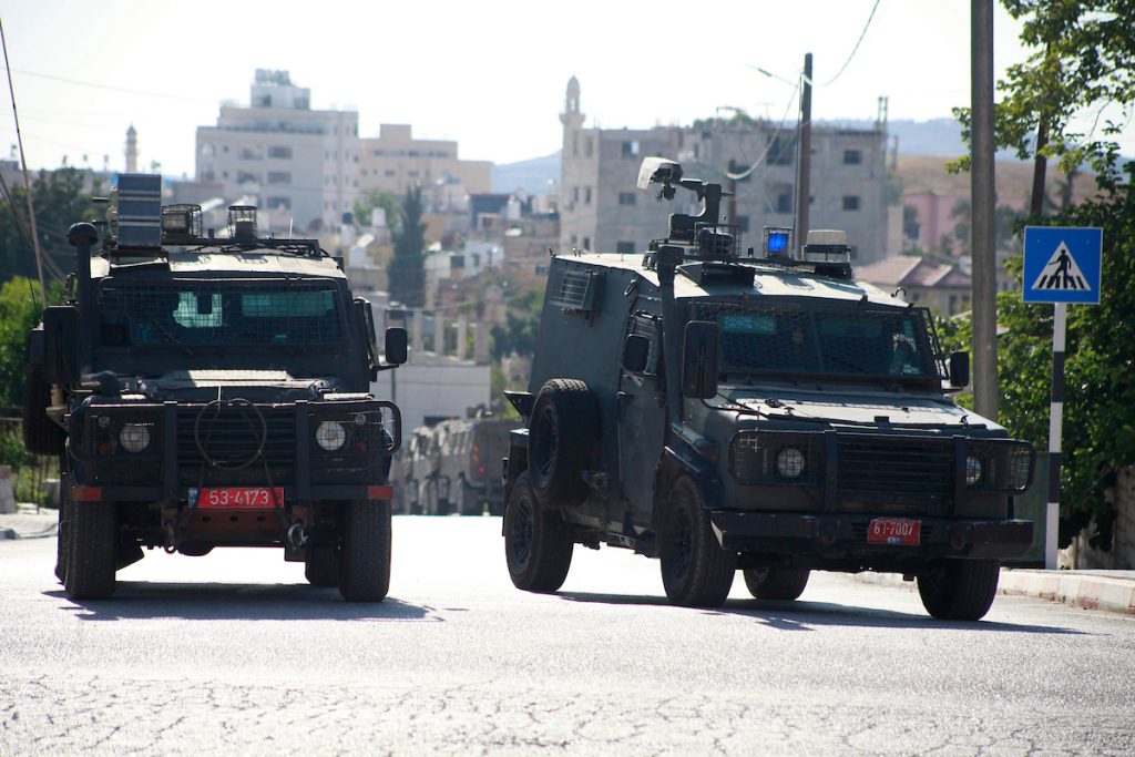 Israeli army forces surround and raid the home of Ammar Odeh in Salfit, in the northern West Bank, on August 4, 2024. (Photo: Mohammed Nasser/APA Images)