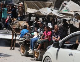 Palestinians flee Al-Maghazi Refugee Camp in the central Gaza Strip, August 17, 2024. (Photo: Naaman Omar/APA Images)