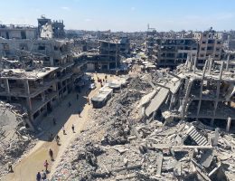 People make their way amid the rubble of buildings destroyed during Israeli bombardment, in the Jabalia camp for displaced Palestinians on August 31, 2024. (Photo: Hadi Daoud/APA Images)