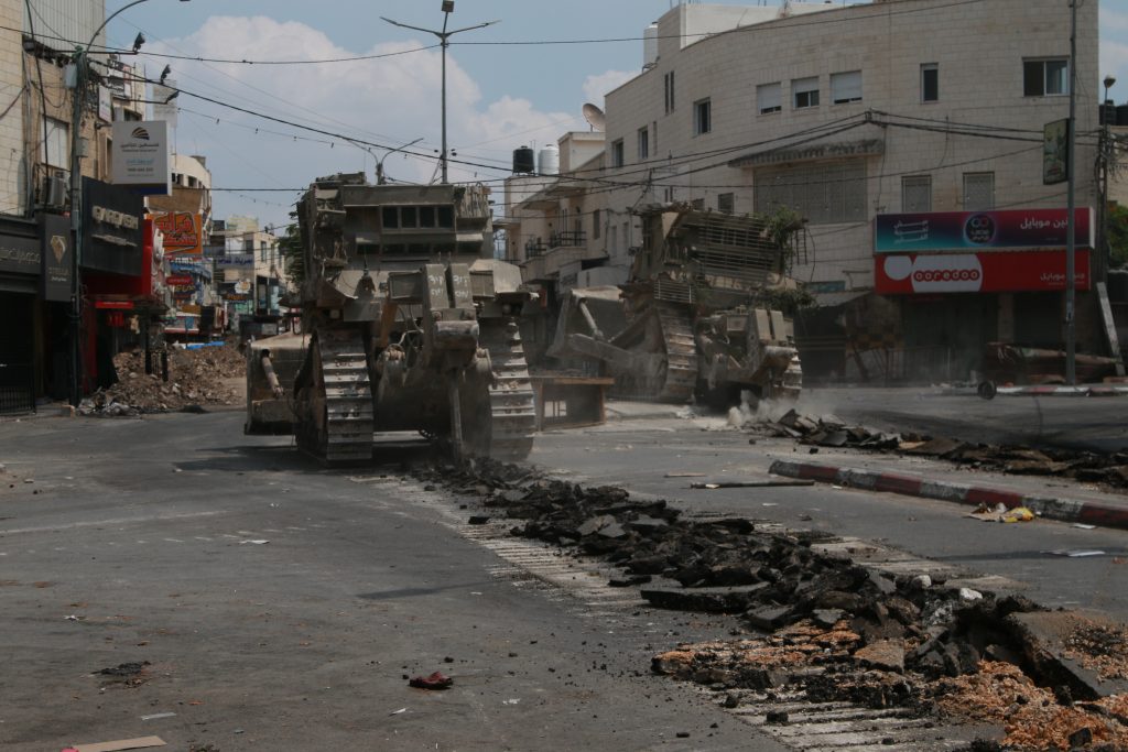 Israeli military bulldozers intentionally rip up roads in the city during the incursion as part of a concerted effort to damage the city’s infrastructure. September 2, 2024. Photo by Shatha Hanaysha.
