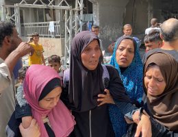 Palestinian residents and Civil Defense teams search for survivors following an Israeli attack on the al-Rimal Clinic in Gaza City, October 10, 2024. (Photo: Hadi Daoud/APA Images)