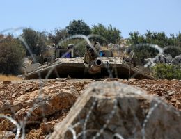 An Israeli tank is seen stationed behind barbed wire on the Lebanese border near the village of Kfarchouba (Photos: © Marwan Naamani/dpa via ZUMA Press/APA Images)