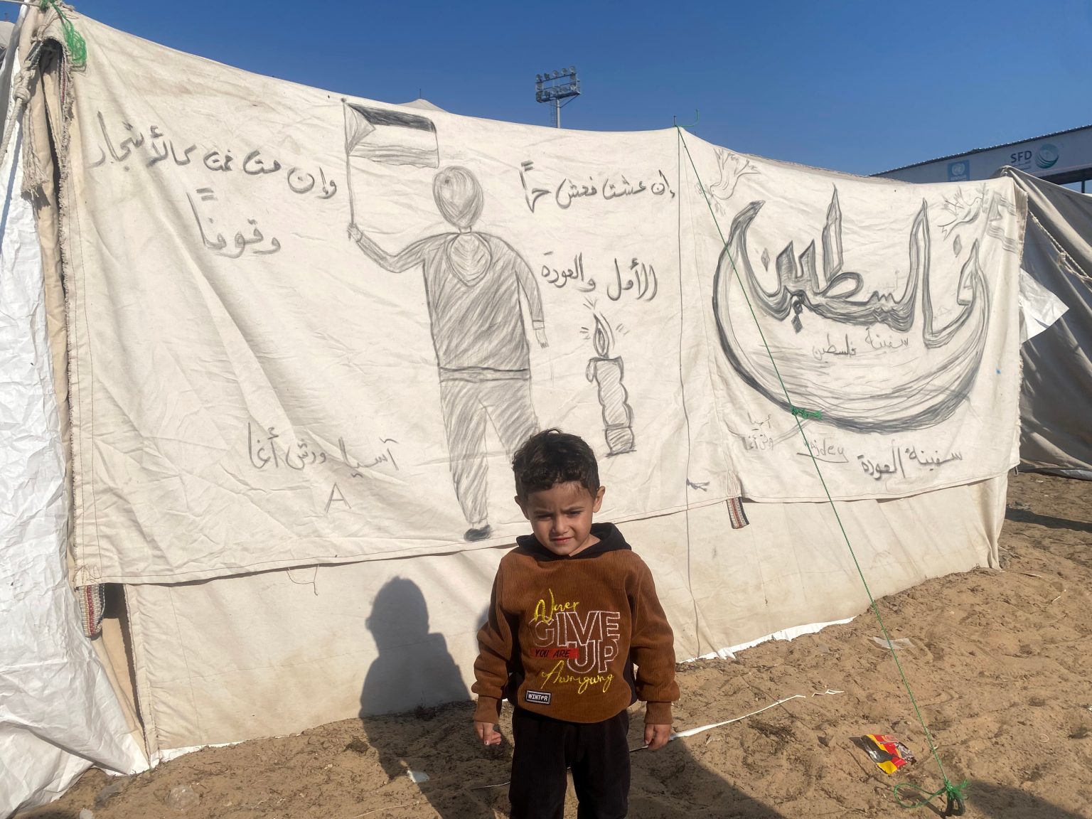 ‘We held out until our last breath’: Palestinians fleeing the north arrive in Gaza City’s first refugee camp