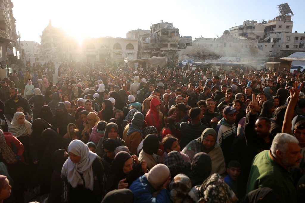 Palestinians wait in crowded queue for hours to buy bread from the only bakery in Khan Younis as Israeli forces are allowing limited quantities of flour and fuel to enter Gaza, on November 18, 2024. (Photo: Stringer/APA Images)