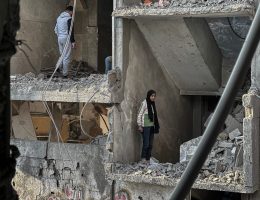 Palestinians check the devastation in front building destroyed in an Israeli airstrike in Nuseirat in the central Gaza Strip on December 1, 2024, amid the ongoing war between Israel and Hamas militants. (Saed Abu Nabhan/ apaimages)