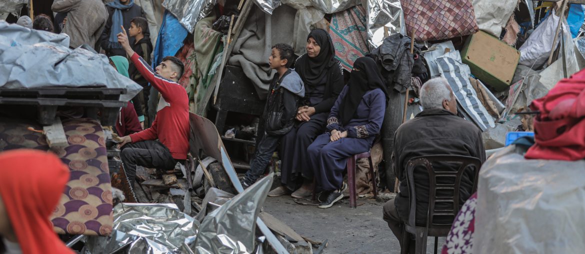 Displaced Palestinians inspect the damage at a makeshift camp that was hit in Israeli strikes near the Abu Hmayseh school at the Bureij refugee camp in the central Gaza Strip on December 4, 2024. (Omar Ashtawy /apaimages)