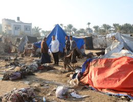 Palestinians inspect the damage in the aftermath of an Israeli strike on a tent camp, in Deir El-Balah in the central Gaza Strip, on December 8, 2024. (Photo: Omar Ashtawy/APA Images)