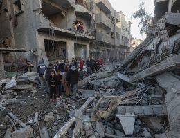 Palestinian inspect buildings that sustained damage after an Israeli attack on the Nuseirat Refugee Camp in Gaza City, Gaza on December 13, 2024. (Photo: Omar Ashtawy/APA Images)